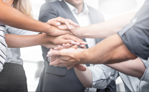 Teamwork - stacked hands